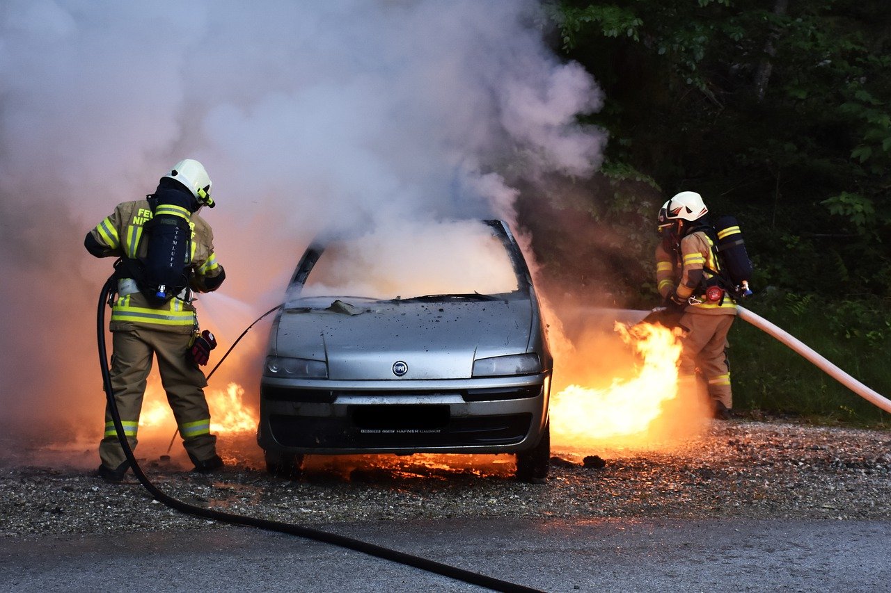 Car on fire being put out